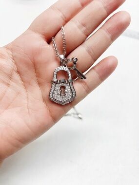 FAC lock and key necklace